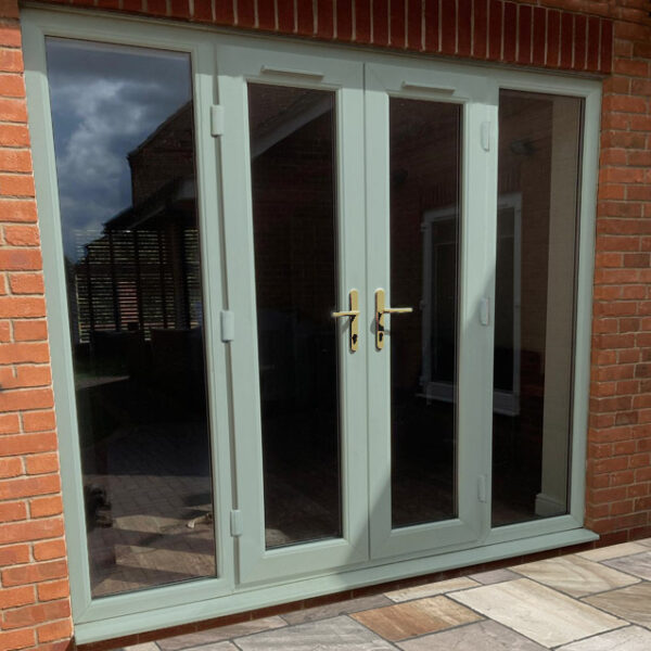 Chartwell Green uPVC French doors with side windows